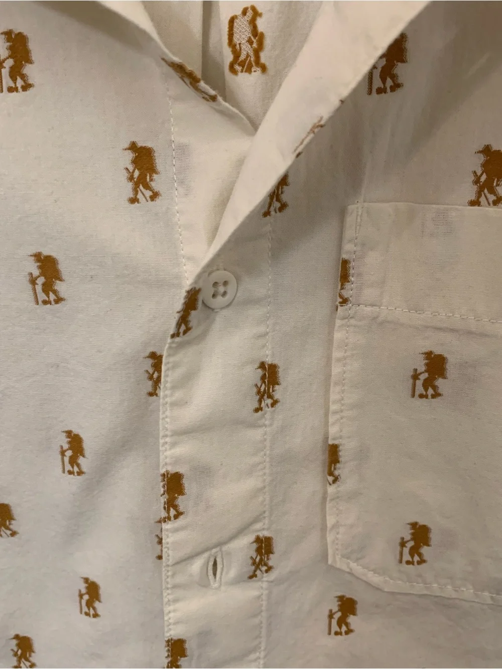 The North Face Beige Short-Sleeve Button-Down Shirt with Brown Hiker Print
